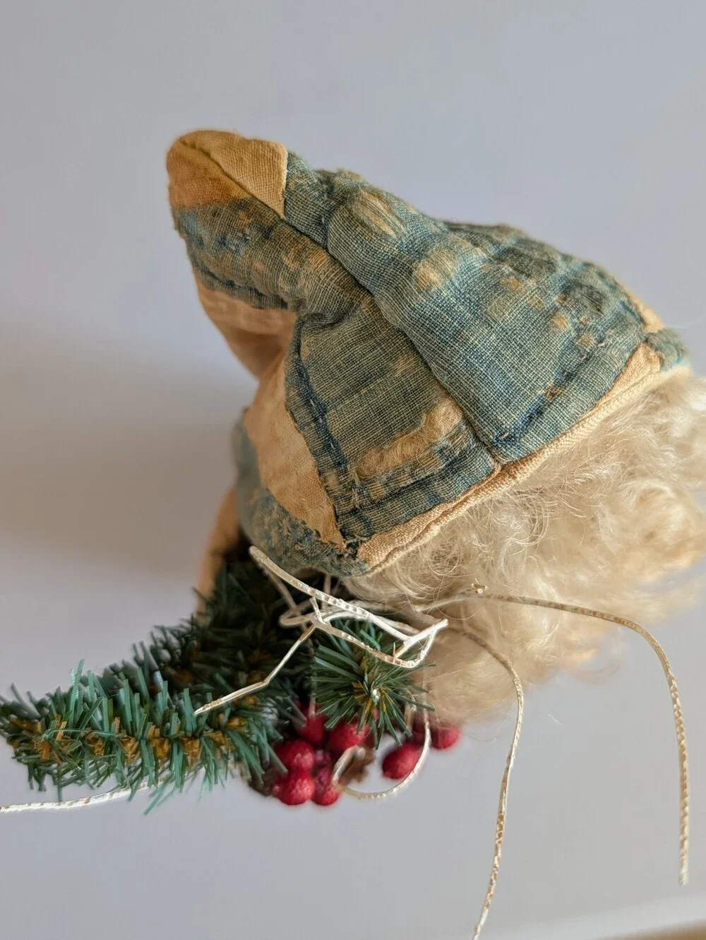 FOLK ART SANTA CLAUS wearing an antique quilt